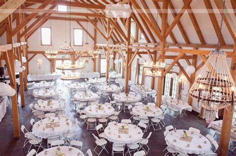 The many strands of light that illuminate the barn create an intimate and romantic ambiance. Outdoor Barn Wedding near Columbia, MO - Blue Bell Farm