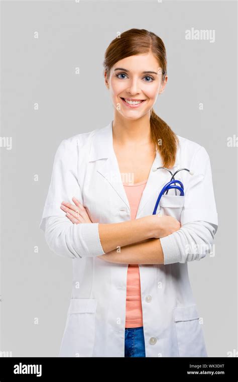 Beautiful And Attractive Female Doctor Isolated Over A White