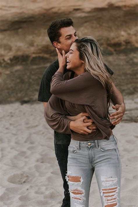 Couple beach, Couples engagement photos, Couple photography poses
