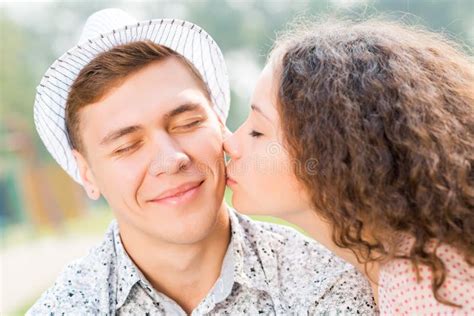 Girl Kissing A Man On The Cheek Stock Photo Image Of Date Caucasian