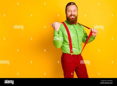 Photo Of Attractive Funny Guy Cool Funky Look Indicating Thumb Finger Empty Space Sale Shopping
