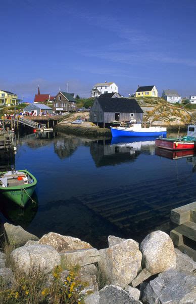 Beautiful Village Of Peggys Cove With Harbor And Fishing Sheds In