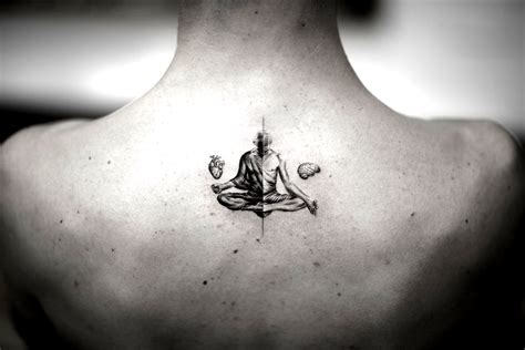 This Is A Single Needle Tattoo Of A Monach Meditating And Balancing A
