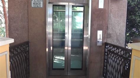 Free water bottles in the room. KONE Hydraulic Glass elevator outside the Wynn Hotel ...