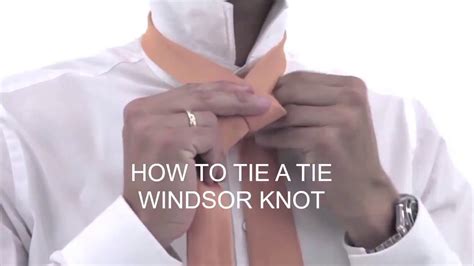 Pull the wide end up through the opening at the neck, then down. HOW TO TIE A TIE EASY - Windsor Knot - YouTube