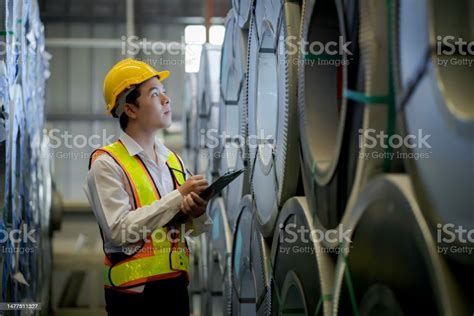 A New Generation Of Engineers In A Metal Sheet Factory Studying Work