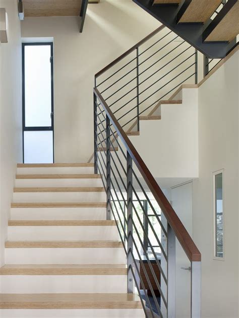 Designing a banister from scratch gives full freedom of expression. steel flat bar hand rail staircase modern with wood glass ...