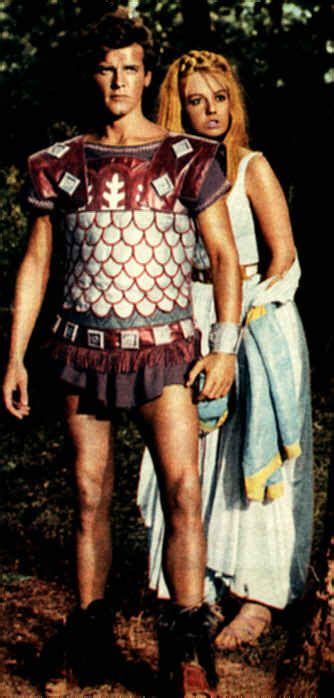 roger in full roman attire and his leading lady in romulus and the sabines roger moore