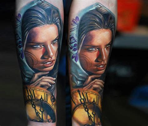 Cute Looking Realistic Woman Face Tattoo On Forearm With Old Golden Clock Tattooimages Biz