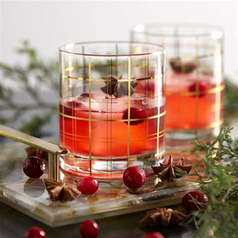 Add ice, preserves, bourbon, triple sec and orange juice to a shaker and shake vigorously for 15 seconds. Christmas Bourbon Cocktail - Cranberry Bourbon Cocktail ...