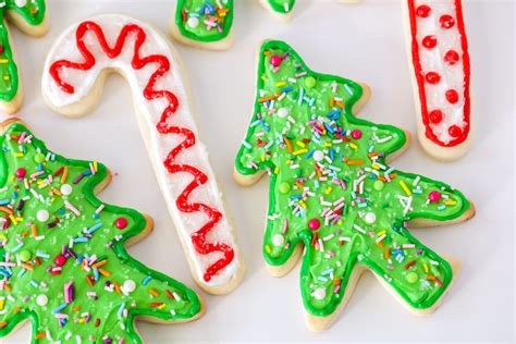 These cookies don't need frosting or icing to look their holiday best — visual appeal is baked right in. Christmas Sugar Cookies + Frosting Recipe | Lil' Luna