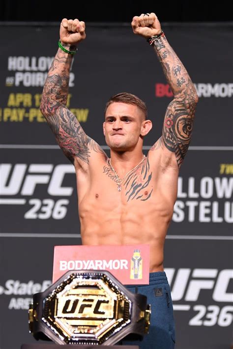 Dustin Poirier Poses On The Scale During The Ufc 236 Weigh In At