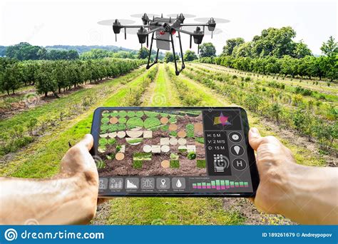 Smart Farming With Agriculture Industry 40 Concept Farmer Use Tractor