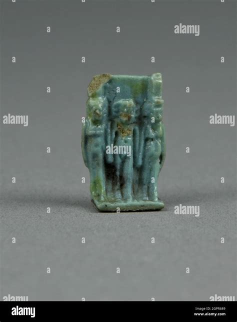 amulet of the goddesses isis and nephthys with horus standing between egypt third intermediate