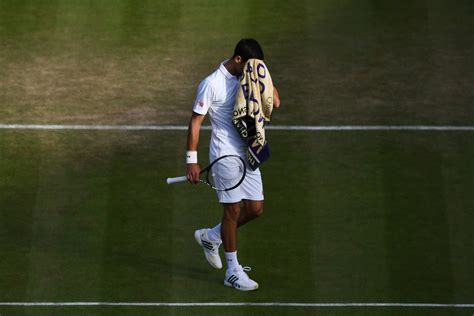 Down Two Sets Novak Djokovic Gets A Break After Rain Suspends Play At