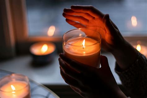 Photo Of Person Holding Scented Candle · Free Stock Photo