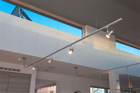 These fantastic suspended ceiling lighting ranges shine significantly brighter than other lighting sources. Suspended track lighting system: Hampshire Light | Modern ...