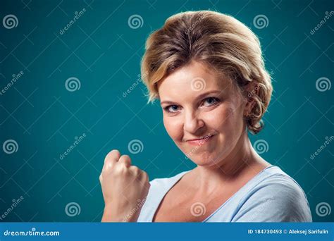 A Portrait Of Angry Woman Showing Fist At Camera People And Emotions