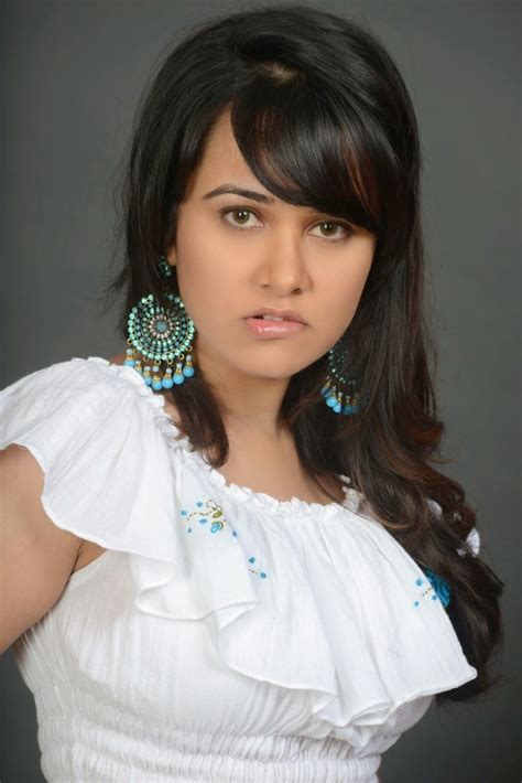 Nisha Kothari Hot Latest Photoshoot In White Dress India Fashion Week Stylish Hair Model