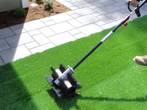Don't water so long that it runs down the street. How To Overseed A Lawn Simple Guide