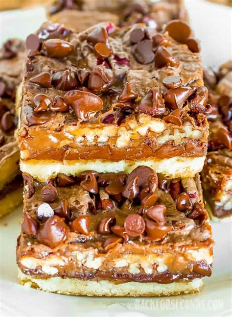 These pecan pie bars are sweet, crunchy, gooey, loaded with pecans, an easy shortbread crust and perfect for a crowd! Chocolate Pecan Pie Magic Bars - Page 2 of 2 - Back for ...