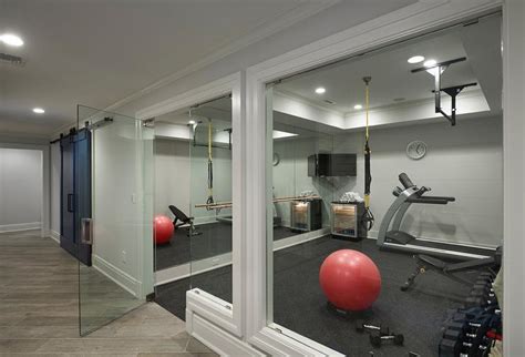 A home gym might be just what you need to find motivation to exercise. Basement Home Gym with Glass Door - Contemporary - Basement
