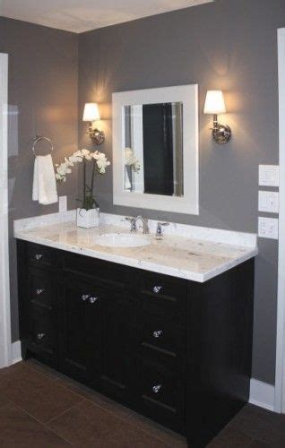 The wall cabinet in white provides versatile storage space with 2 adjustable shelves offering customizable storage behind 2 doors. bathroom espresso cabinet grey wall white trim | New House ...