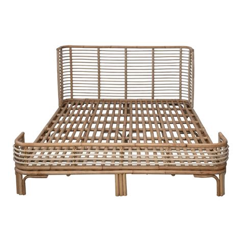 This geometric styled bed has a rattan headboard and a maple bed frame. Bayou Breeze Rattan Queen Sized Bed Frame | Wayfair