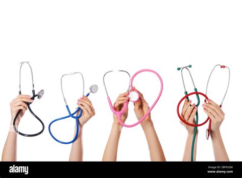 Many Hands With Stethoscopes On White Background Stock Photo Alamy