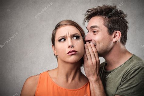 Man Telling A Secret To A Woman Stock Photo By ©olly18 33265117