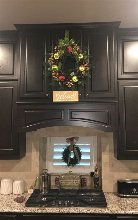 Christmas Garland On Top Of Cabinets