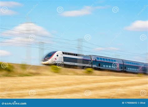 A Tgv Duplex High Speed Train In The French Countryside With Motion