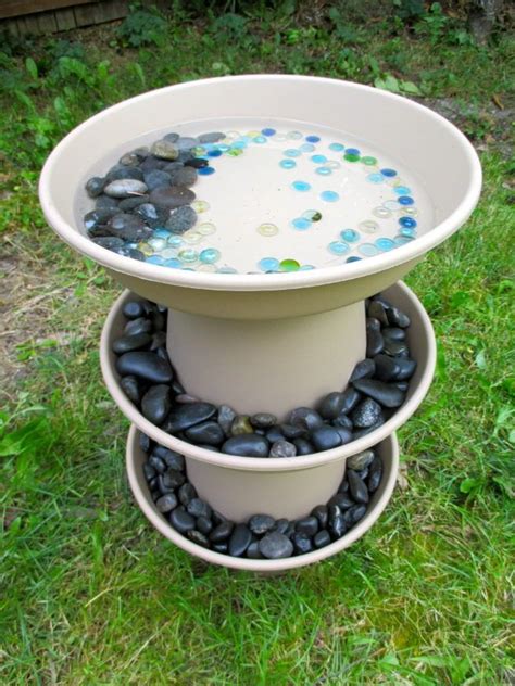 Whimsical fountain can also serve as a bird bath. 10 Beautiful DIY Bird Bath Ideas - Just Craft & DIY ...