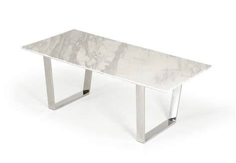 The frame table is a dining essential, providing a spot for everyday meals, holiday gatherings or even game nights. Modrest Heidi Modern Marble Dining Table