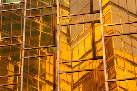 Golden Building Windows Glass Of Modern Office Skyscrapers In