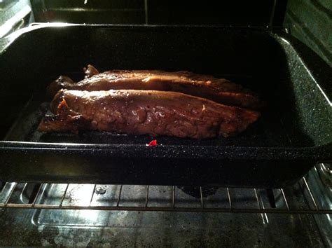 Cut loin from ribs, and slice loin; taylor made: Asian brined pork loin with a hoisin glaze & sesame greens