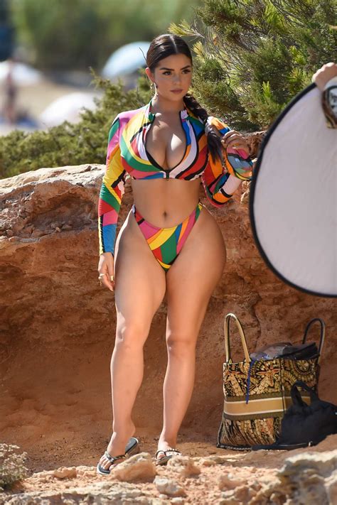 Demi Rose Stuns In A Colorful Bikini While Posing For A Beach Photoshoot In Ibiza Spain