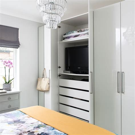With a number of drawers and flexible diy, this bedroom with wardrobe is mostly when you choose this wall wardrobe design for bedroom, you add to the space available in the room. 15 Photos Built In Wardrobes With Tv Space