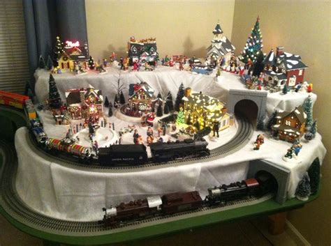 2015 Dept 56 Snow Village And Lionel Train Layout Around The Christmas