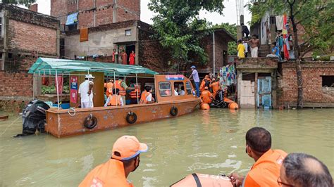In Pics Over 5 Lakh People In 1243 Up Villages Affected By Floods
