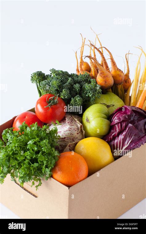 Fresh Fruit And Vegtebles In A Cardboard Box Stock Photo Alamy
