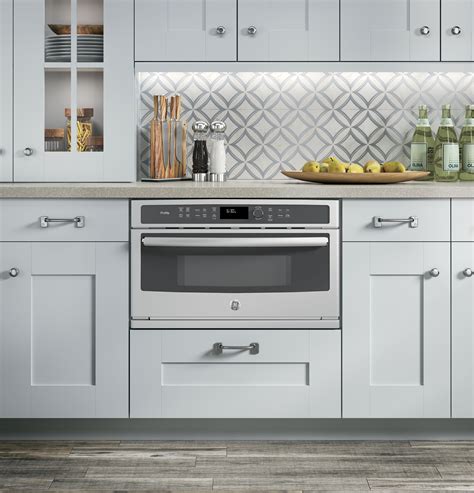 A kitchen island isn't only a functional cooking countertop, it's a part of décor, a storage space, a seating area and it can fulfill almost any other function that you want. GE Profile™ Built-In Microwave/Convection Oven ...