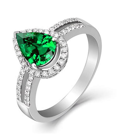 In 14k white gold (1/6 ct. 2 Carat Emerald and Diamond Halo Engagement Ring in White Gold - JeenJewels