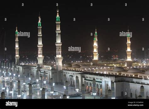 Moon Between Two Towers Of The Prophets Mosque In Al Madinah Saudi