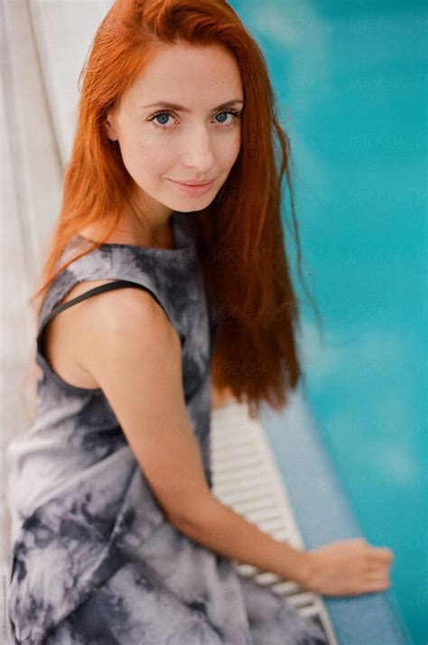 portrait of beautiful ginger woman looking at camera by stocksy contributor amor burakova