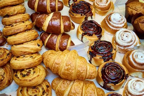 Premium Photo Fresh Baked Pastries Close Up On A Bakery Showcase