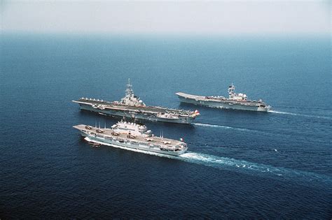 Three aircraft carriers are underway in formation during the joint ...