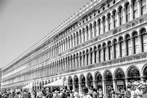 Converging Arches And Crowds Of St Marks Square Photograph By