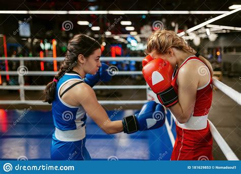 Women In Red And Blue Gloves Boxing On The Ring Stock Image Image Of Kickboxing Fight 181629853