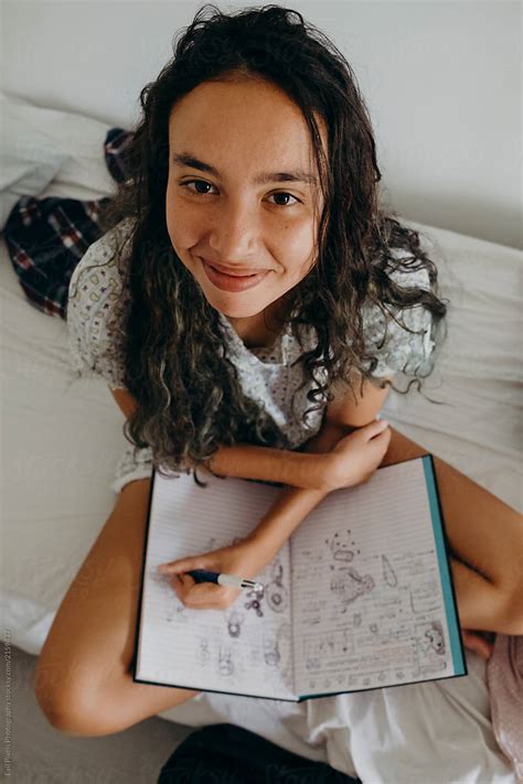 Portrait Of A Girl Drawing In Her Sketch Book By Stocksy Contributor Branislava Zivic Zrnic